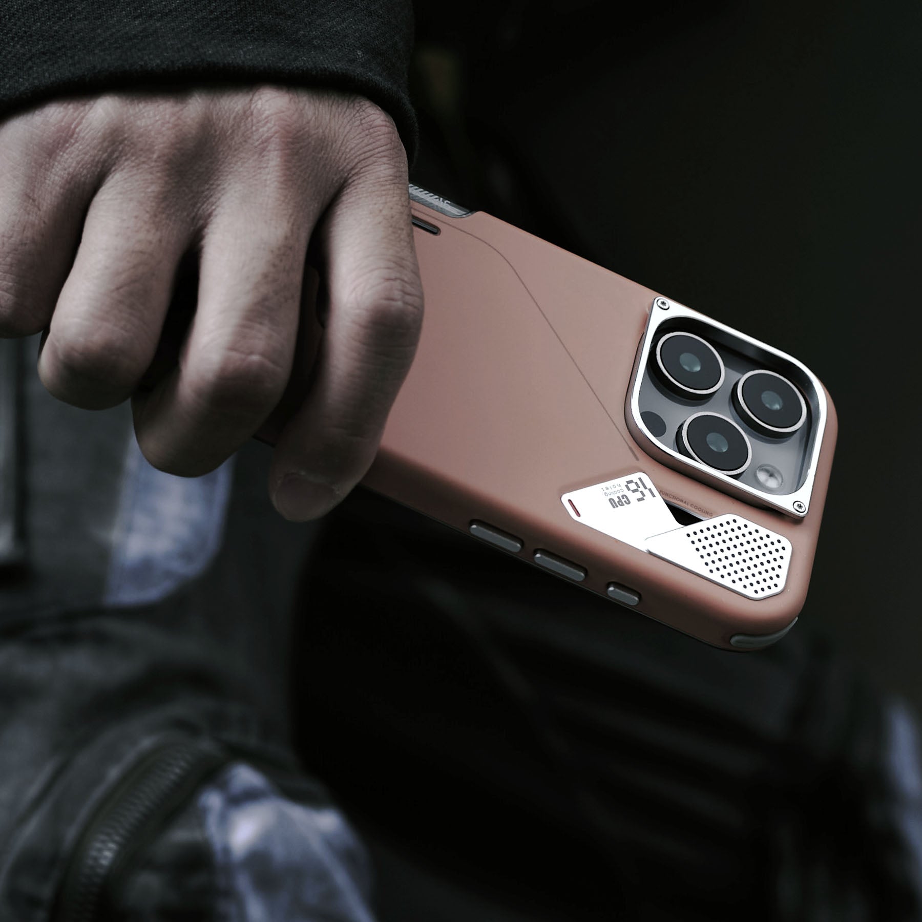 AULUMU A16 slim brown shockproof case for iPhone 16 Pro with real-cooling back and raised camera control cover held in hand outdoors